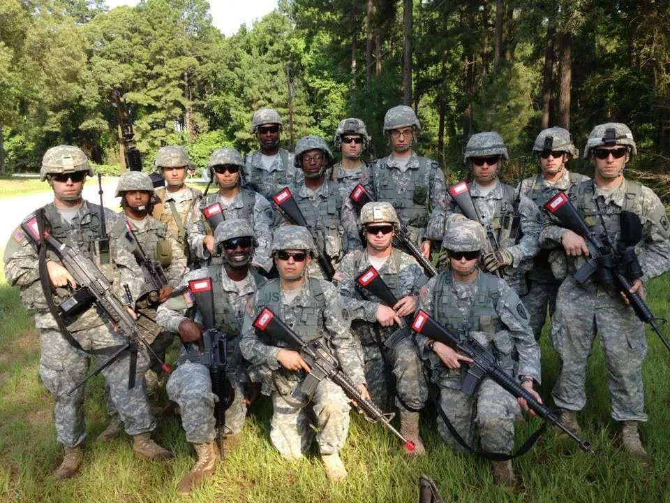 Amilcar Ayala with fellow soldiers during Army service.