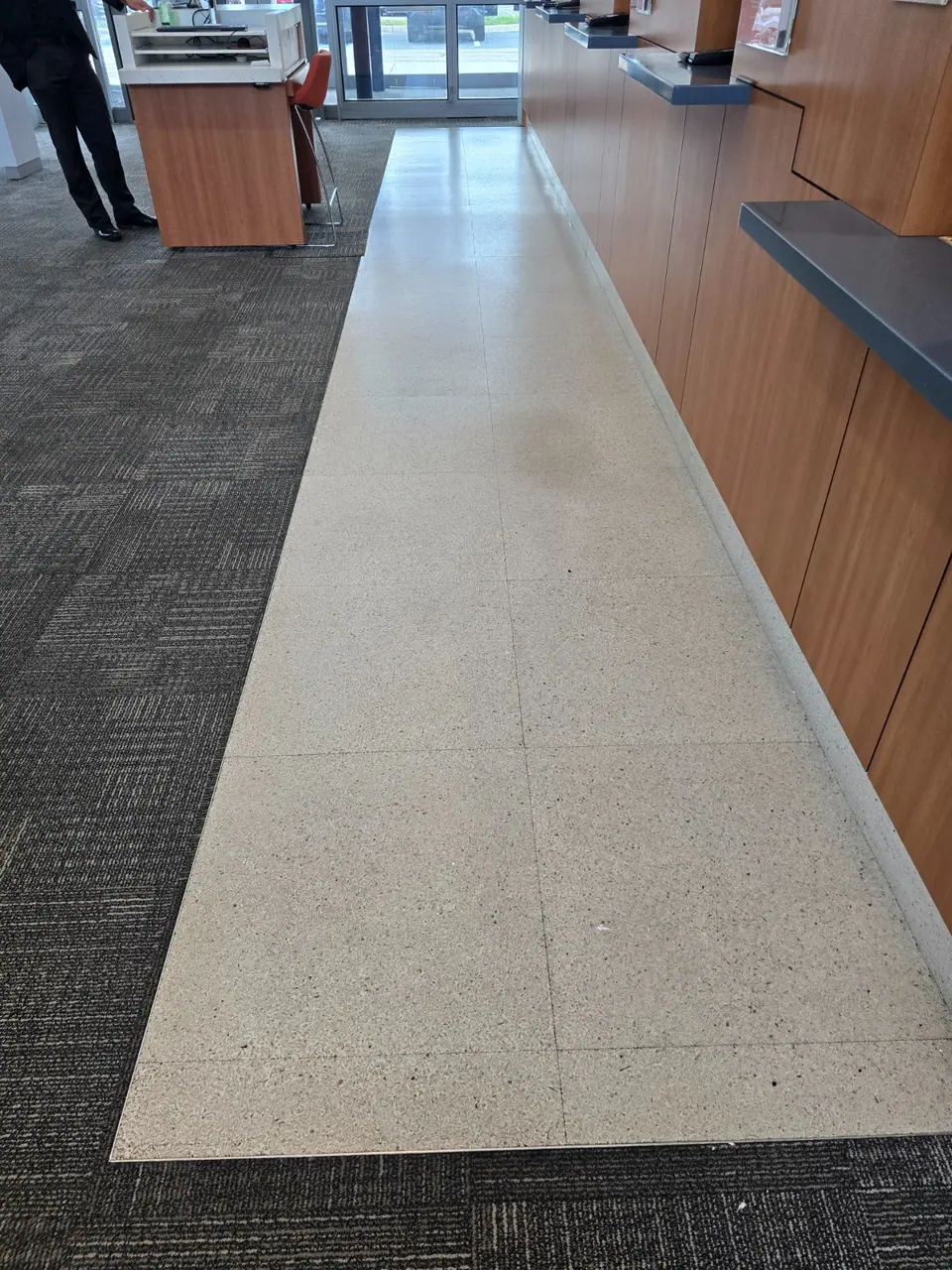 Terrazzo floor before stripping and recoating.