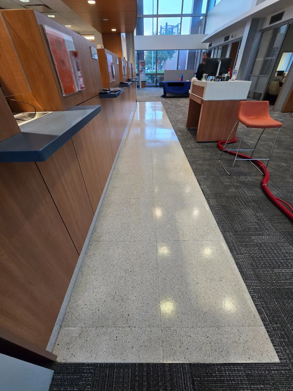 Finished terrazzo walkway with an even reflective surface.