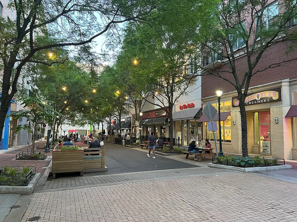 An evening view along the pedestrian street at Rockville Town Square, Rockville, Maryland.