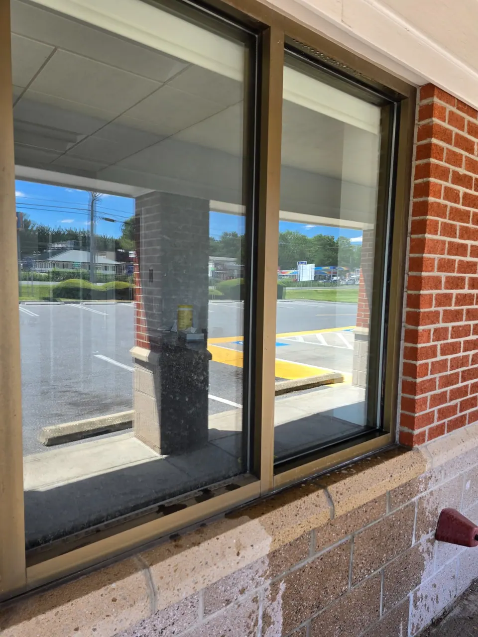 Second window-cleaning comparison with the left pane dirty and the right pane clean.
